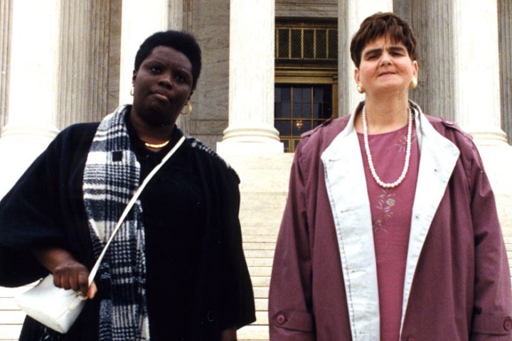 Lois Curtis and Elaine Wilson stand on the steps of the Supreme Court in Washington, D.C. Lois Curtis and Elaine Wilson stand on the steps of the Supreme Court in Washington, D.C.