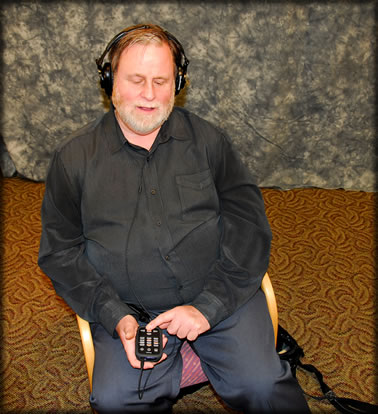 A person with a disability using assistive technology