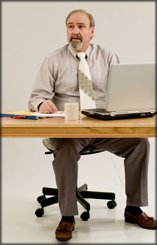 A person with a disability at a work desk.