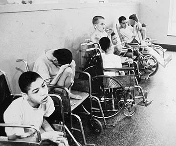 Row of children in wheelchairs