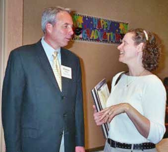 Shamus O'Meara talks with Class 25 graduate