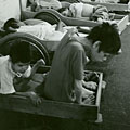 Row of children in beds